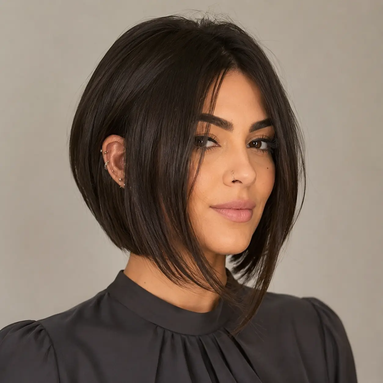 Midi contour bob with a softly stacked back and longer face-framing front pieces on fine hair
