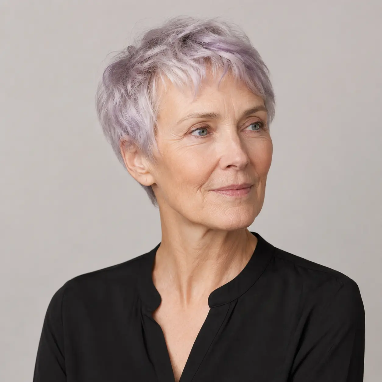 A textured pixie with a lavender tint is a playful, modern take on silver on a woman over 70
